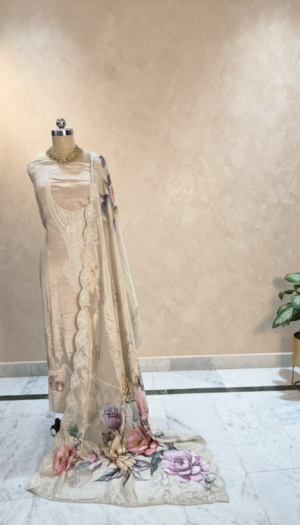 Landing Page Premium ivory organza embroidered suit set with floral organza dupatta and shantoon bottom displayed on mannequin in luxury studio background